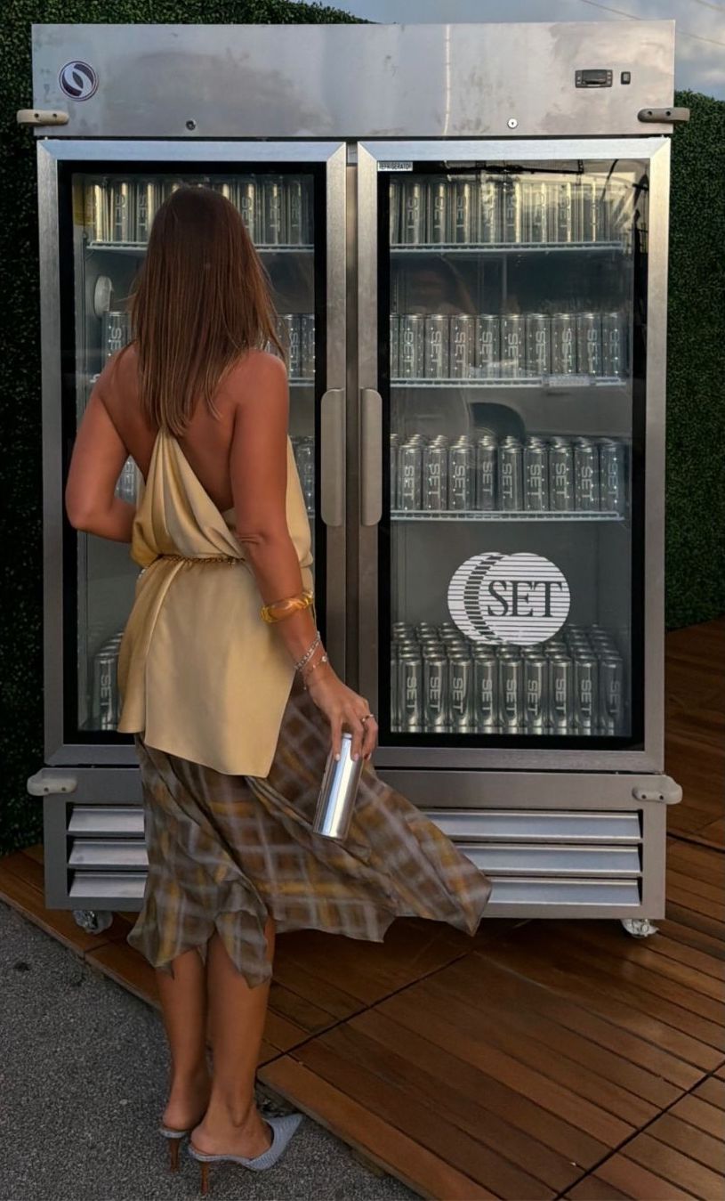 SET Active brand activation fridge with custom canned water — event branded drinks